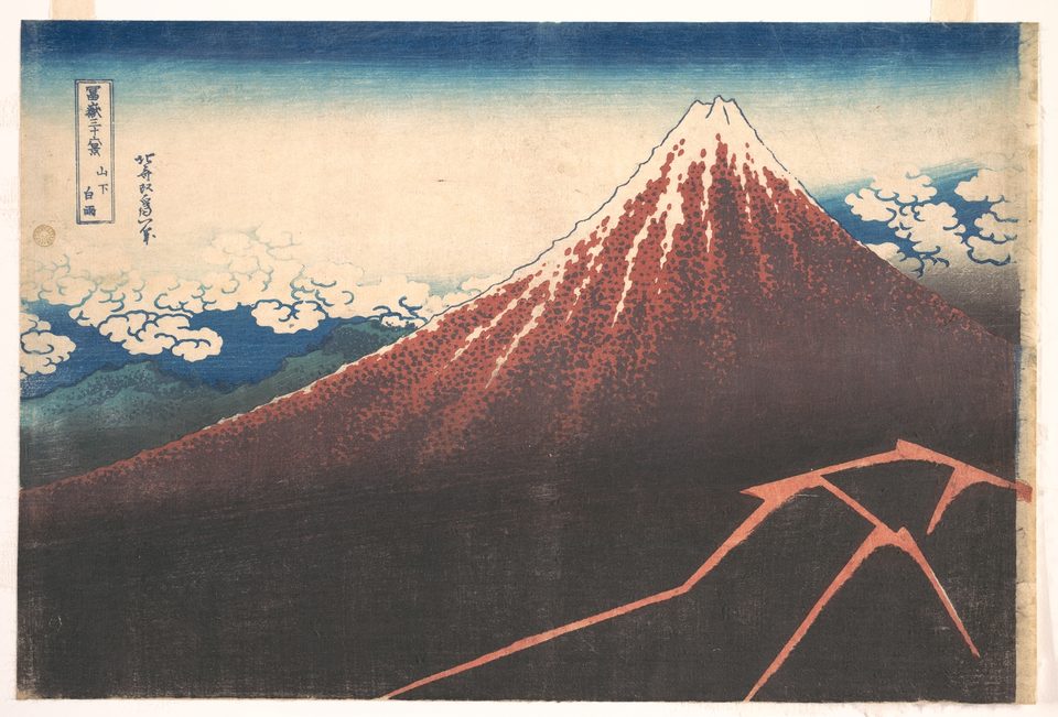A Hokusai print: the ochre-red summit of Mount Fuji floats above cloud while lightning splits the darkness on its lower slopes.