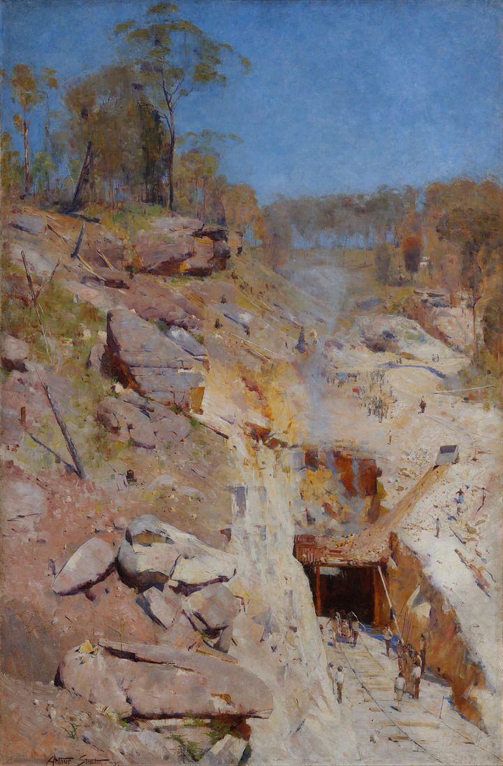 A Streeton oil painting: a sandstone valley and scree slope under hard sun, with a railway tunnel mouth at the foot of the slope.